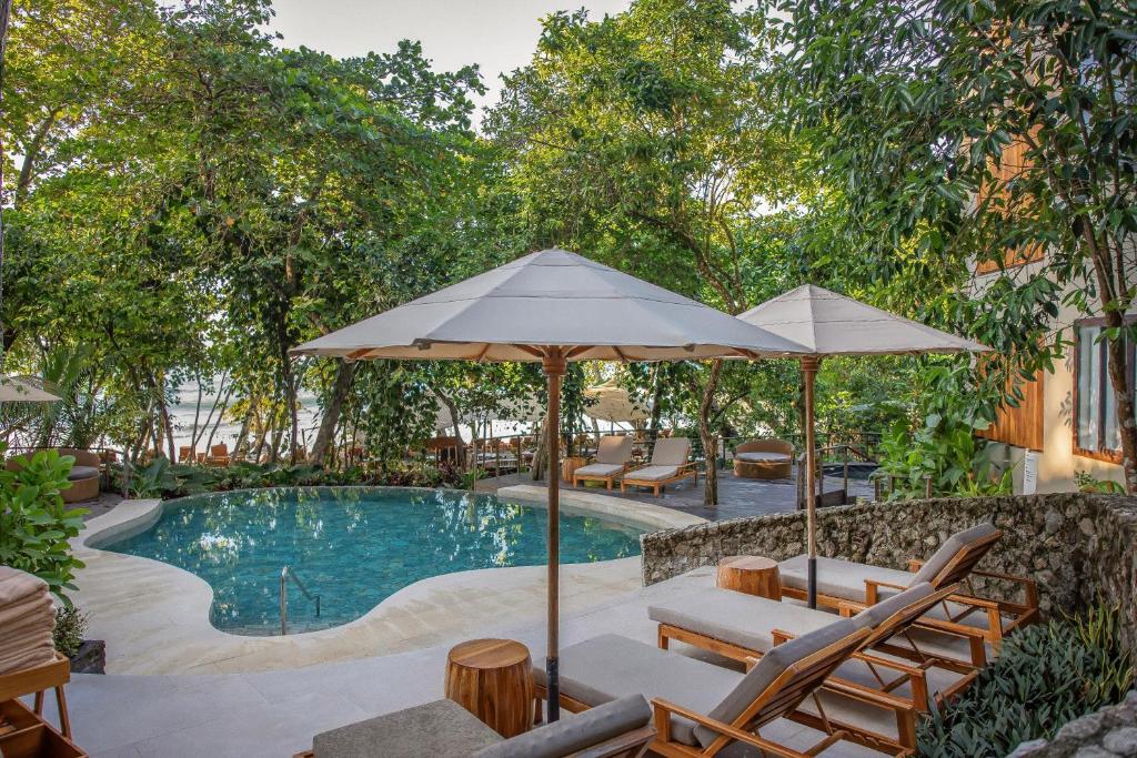 Hoteles en Manuel Antonio, Costa Rica arenasdelmarbeachfrontrainforestresortmemberofthecayuga